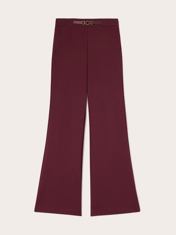 Pantalones flare en punto Milano con cintur&oacute;n