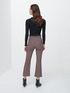 Geometric patterned flared trousers image number 1
