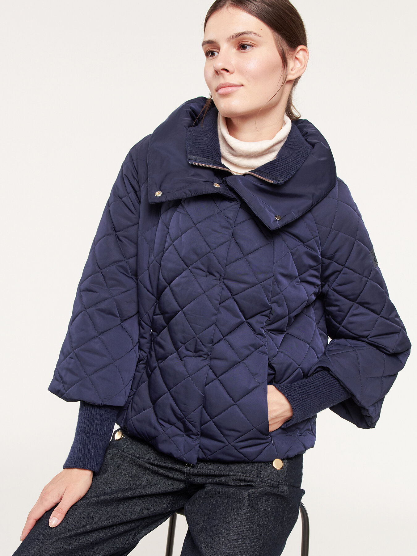 Trapeze cut down jacket with knitted inserts image number 0