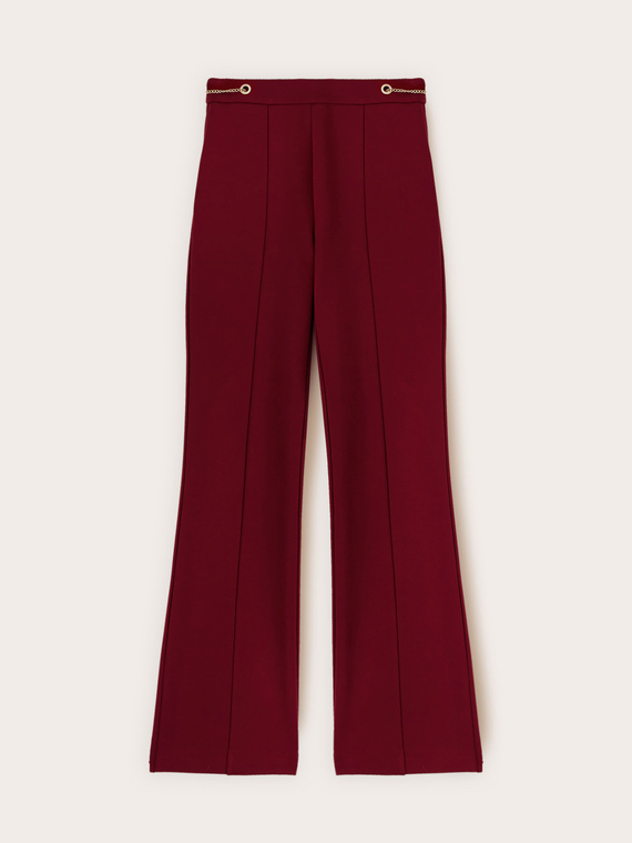 Flare pants with eyelet pattern