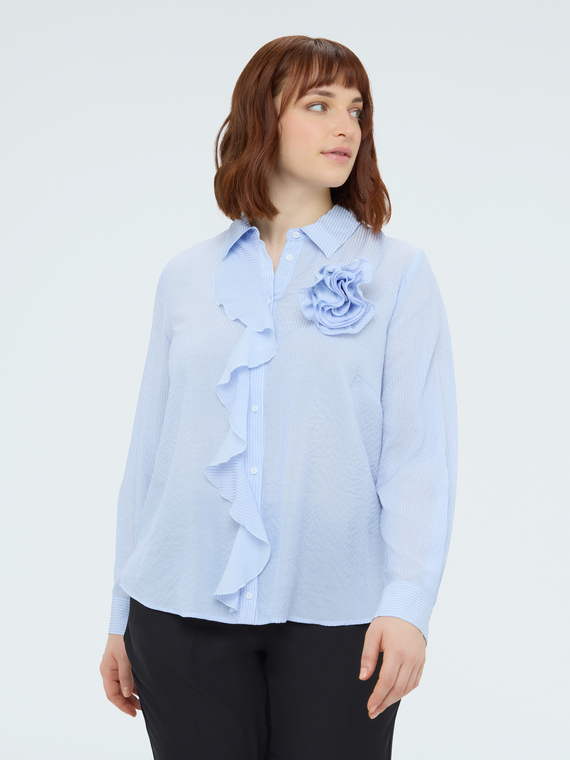 Shirt with ruffles and flower