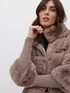 Fur-effect cape with knitted trims image number 2