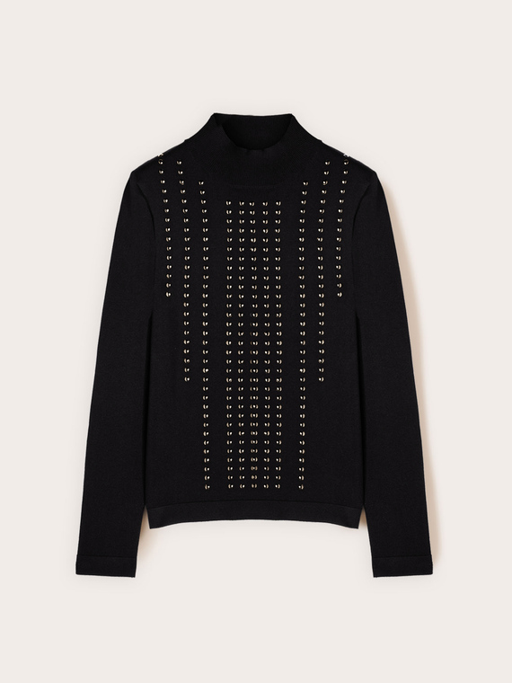 Pull &agrave; col roul&eacute; avec applications