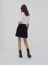 Short pleated skirt image number 1